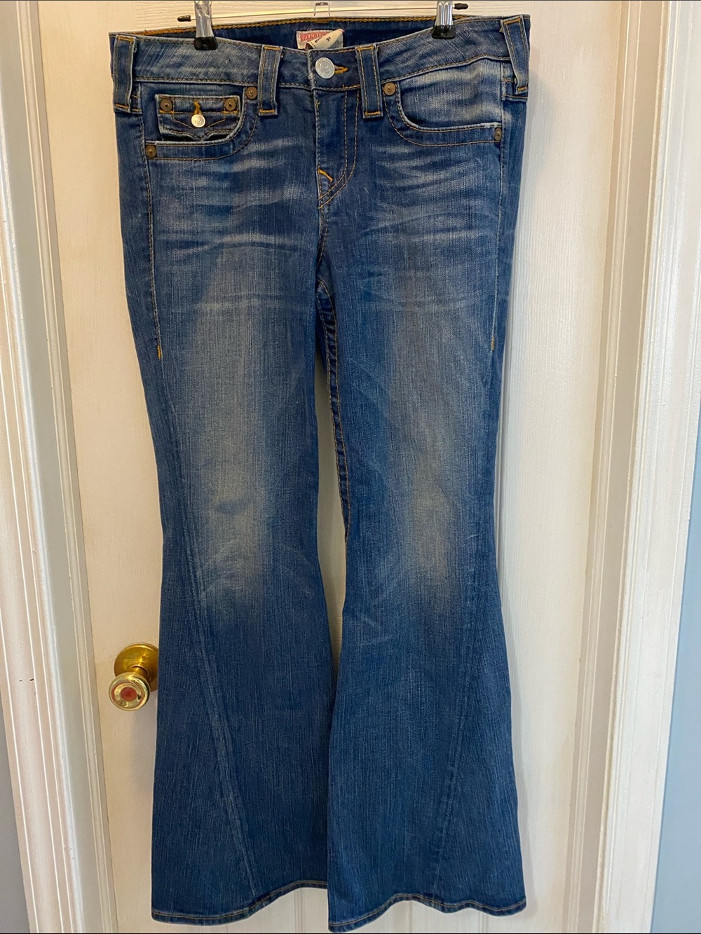 True Religion Medium Blue Flare Jeans with Faded Finish